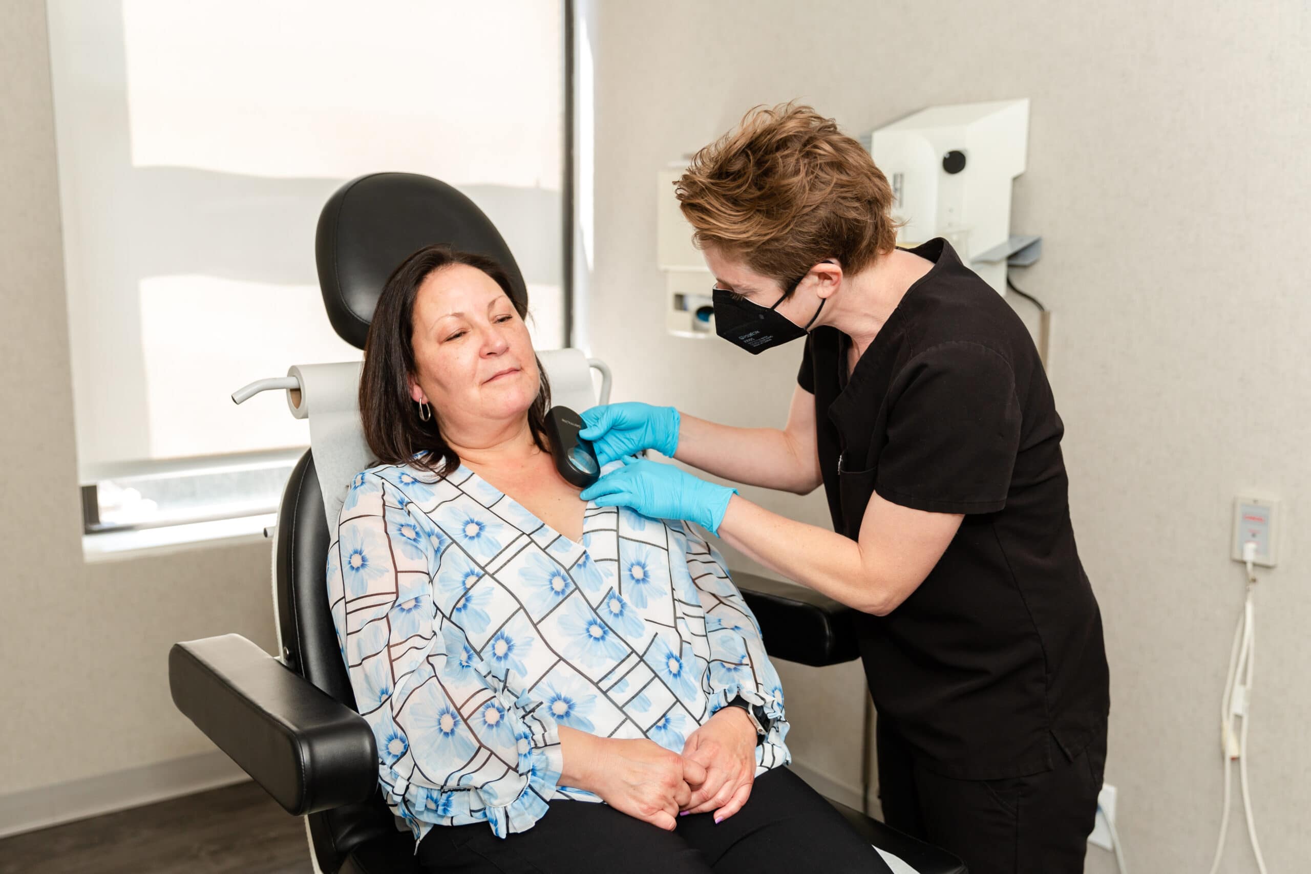 dermatologist on a skin cancer surgery consultation with a patient from Englewood Cliffs