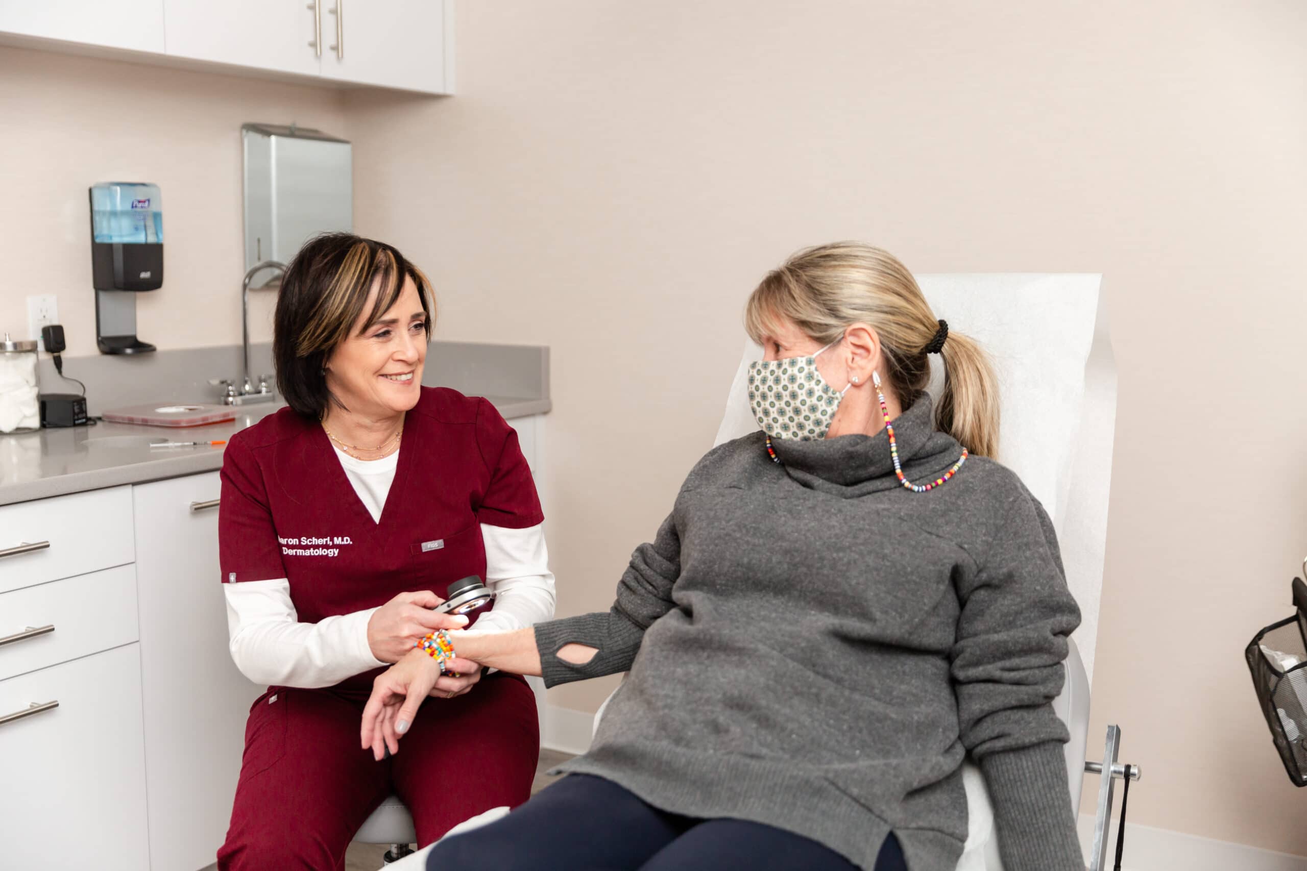 dermatologist and a patient discussing eczema treatments