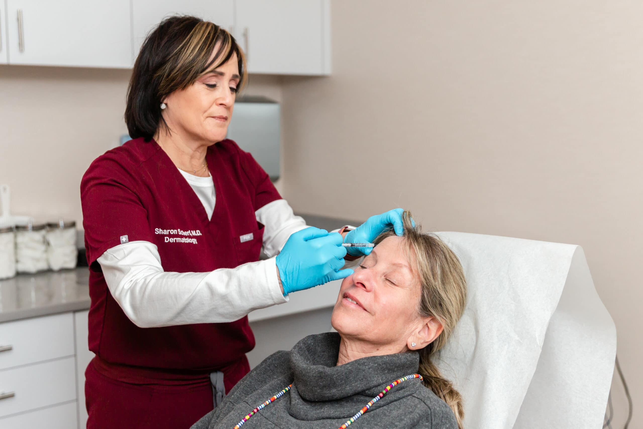 dermatologist treating a patient with Botox Cosmetic injections in Englewood Cliffs